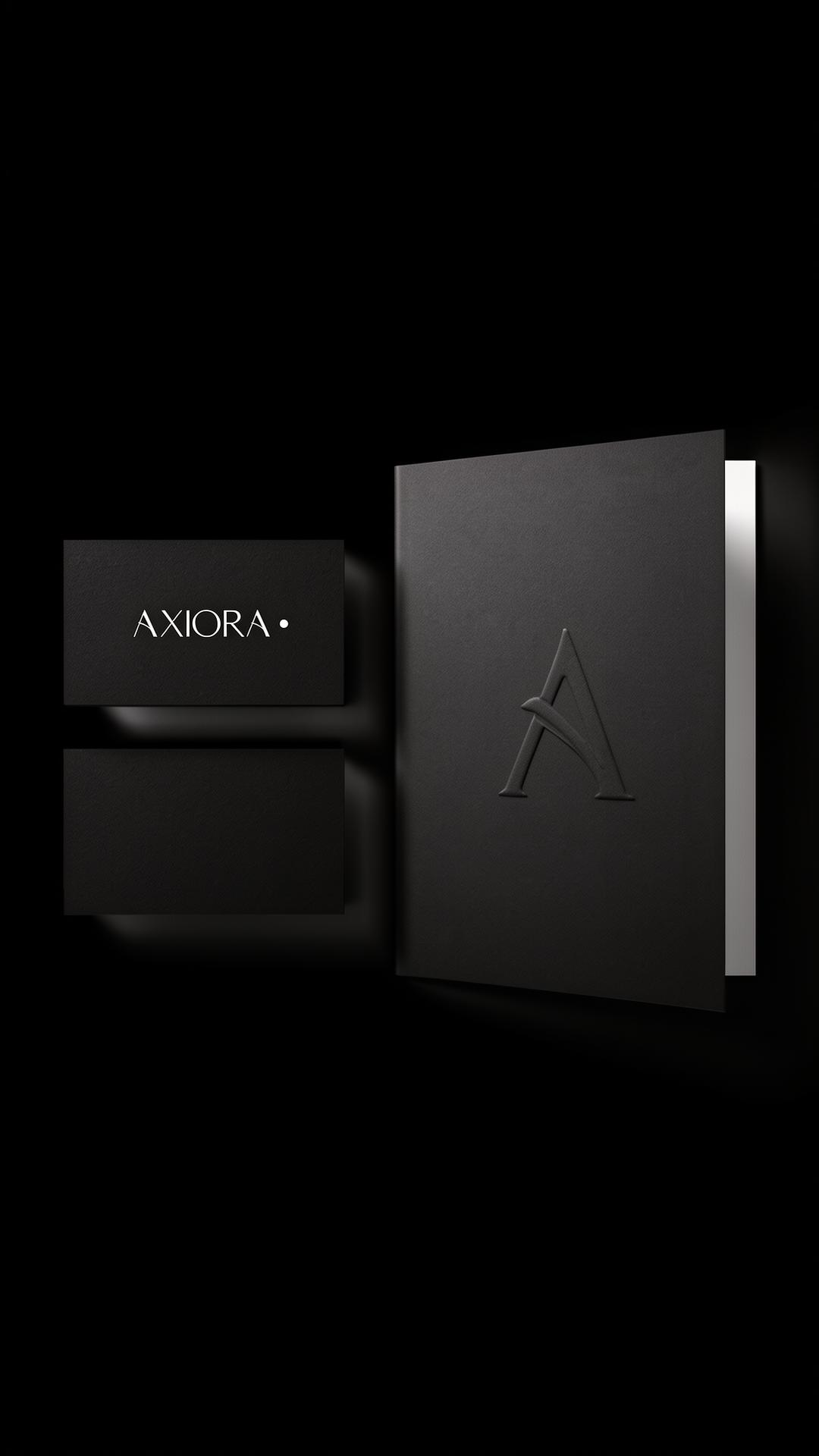 Axiora brand identity — business card and guidelines presentation